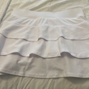 Cute layered Kodak tennis skirt.